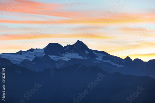 Sunrise over Großglockner on a partly cloudy day in summer