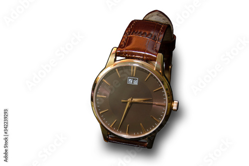 Isolate of wristwatches with leather strap on a black background.
