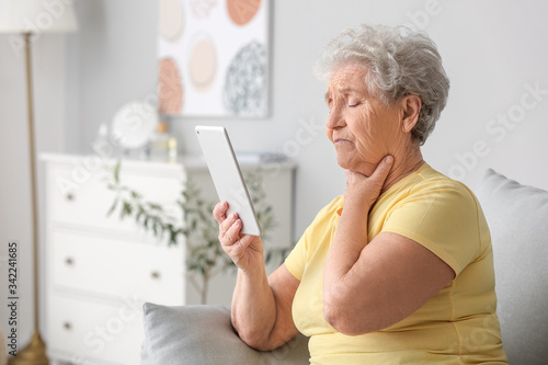 Elderly woman video chattin...