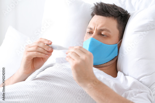 Man in protective medical m...