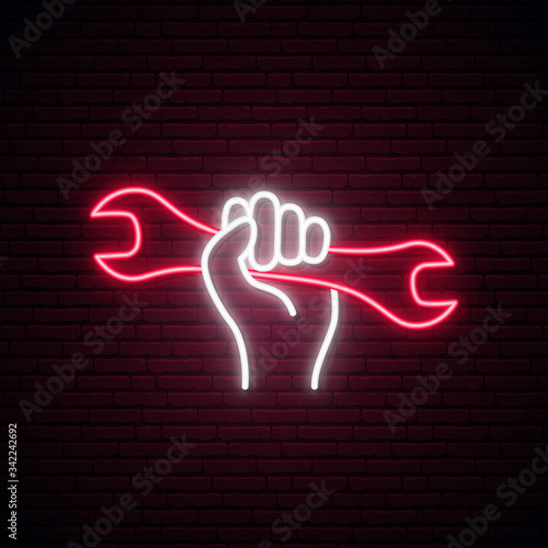 Hand holding wrench neon sign. 1st may, Labor Day neon signboard. Stock vector illustration.