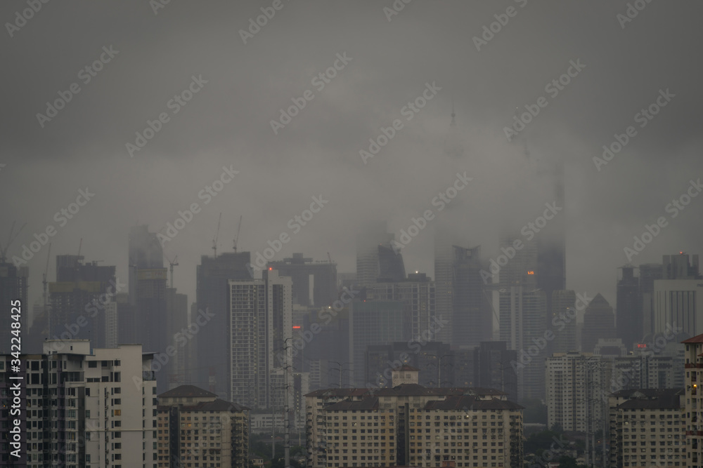 KUALA LUMPUR, MALAYSIA - 22th APR 2020; View of monsoon rain over down town Kuala Lumpur, Malaysia.