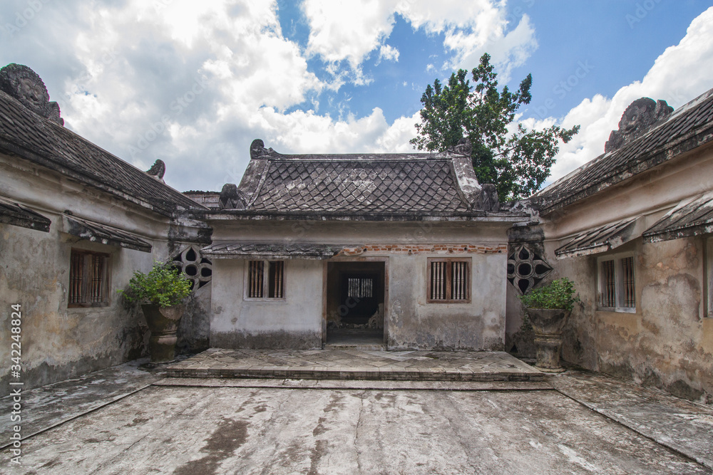 a sacred old building where people give their offerings for their wishes to come true at Taman Sari area, Yogyakarta, Indonesia