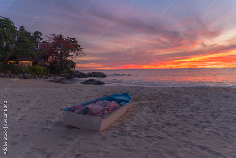 stunning red sky at sunset over the sea at Karon beach Phuket Thailand. stunning red sky at sunset over the sea at Karon beach Phuket Thailand.
