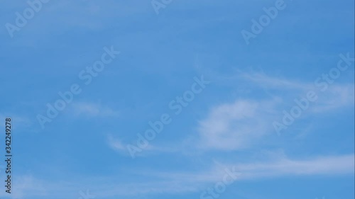 moving white cloud with  blue sky background at day time