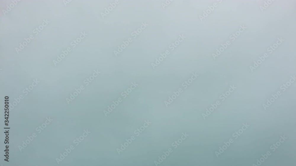 blue smoke cloud colored flowing loop background abstract pattern