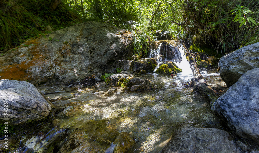 waterfall surrounded by nature in oasi valle di caccia senerchia