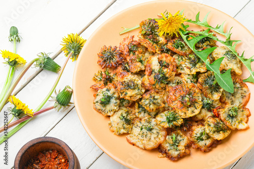 Fotografie Fried dandelion flowers