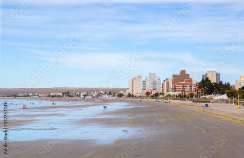 Puerto Madryn, Argentina, city beach. Puerto Madryn is a small port city in Argentine Patagonia, located 860 km South of Buenos Aires, the capital of Argentina.