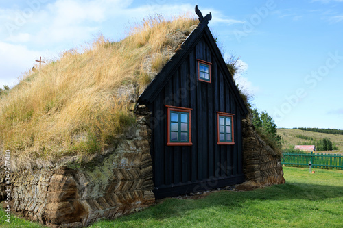 Skagafjordur/ Iceland - August 26, 2017: Vidimiry wooden church, Iceland, Europe photo