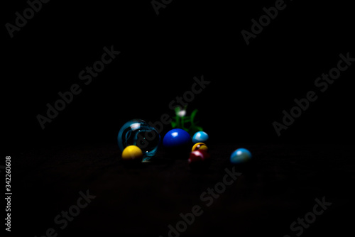 marbles on black background