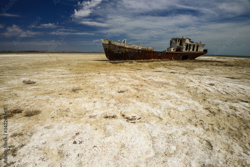 Old fishing schooner at the bottom of the dried Aral Sea