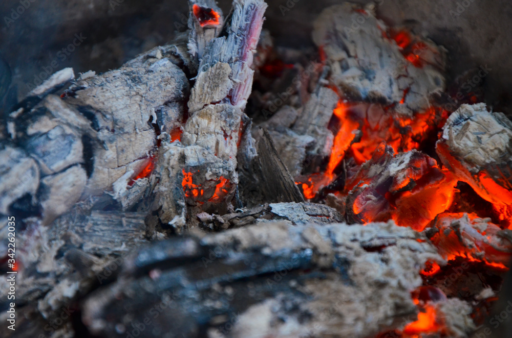 burning charcoal in a fireplace burning charcoal in a fireplace