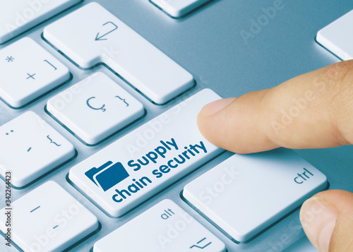 Supply chain security - Inscription on Blue Keyboard Key. photo