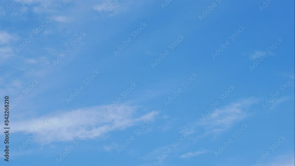 moving white cloud with blue sky background at day time moving white cloud with blue sky background at day time