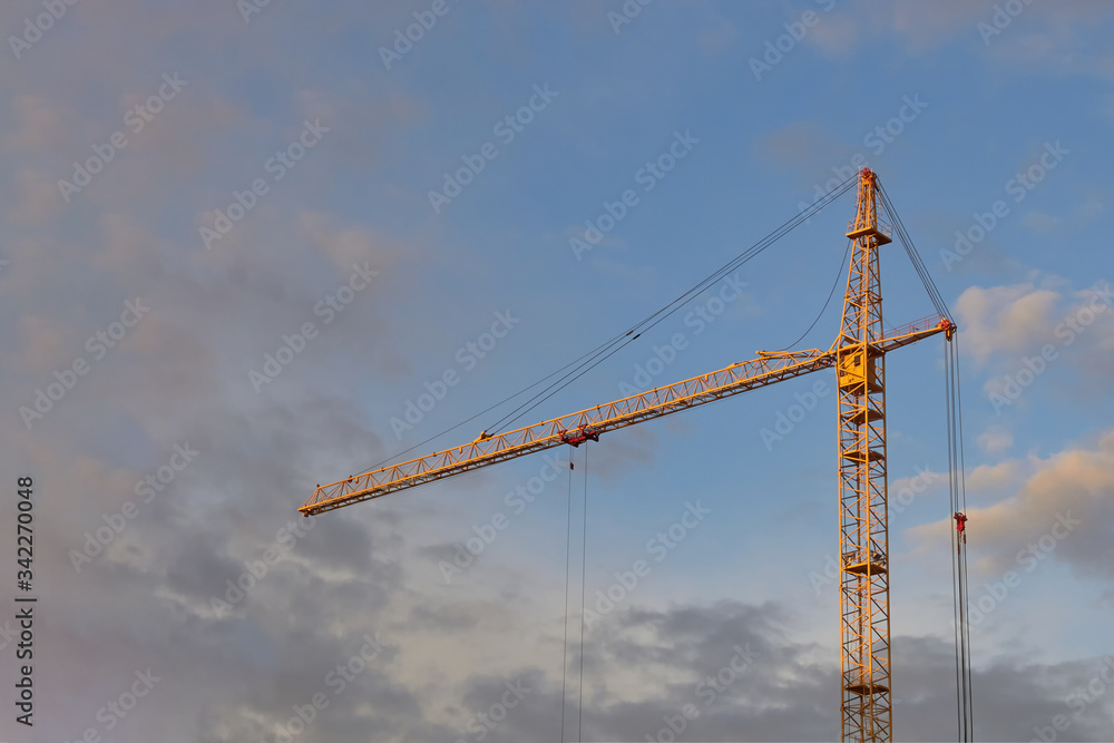 Industrial construction cranes the construction of an building Industrial construction cranes the construction of an building