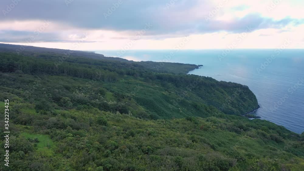 Aerial drone panoramic view of gorgeous Hawaiian coastline with blue waters and green mountains Aerial drone panoramic view of gorgeous Hawaiian coastline with blue waters and green mountains