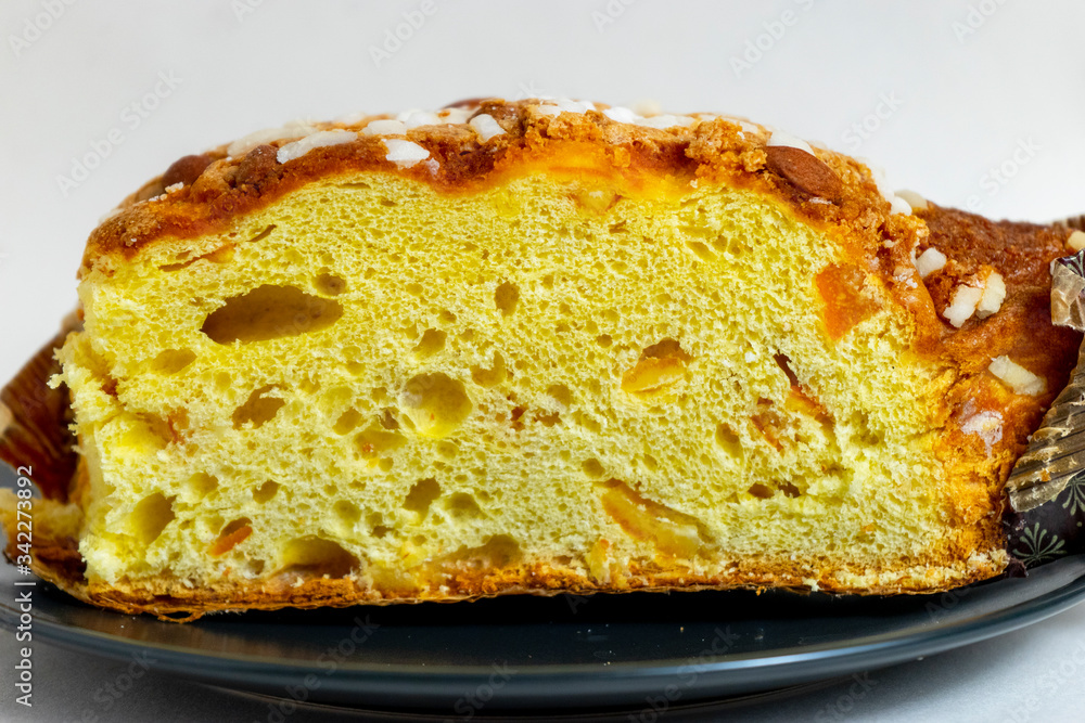 Panettone, Italian Christmas bread, with a brioche-like dough infused with a vanilla bean and studded with rum-soaked raisins and candied orange peel Panettone, Italian Christmas bread, with a brioche-like dough infused with a vanilla bean and studded with rum-soaked raisins and candied orange peel