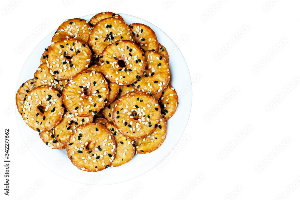 biscuit crackers with sesame seeds, isolated with space for text biscuit crackers with sesame seeds, isolated with space for text
