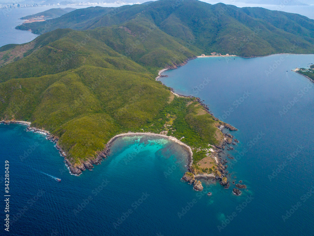 Aerial view of the untouched site of Hon Tre Island, Nha Trang Bay, Khanh Hoa, Vietnam. Best known for housing Vinpearl Amusement Park, a massive aquarium, amphitheatre and shopping mall