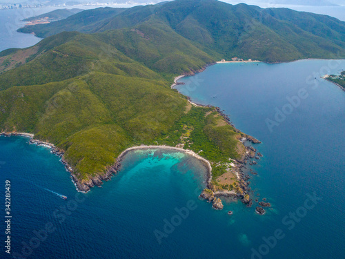 Aerial view of the untouched site of Hon Tre Island, Nha Trang Bay, Khanh Hoa, Vietnam. Best known for housing Vinpearl Amusement Park, a massive aquarium, amphitheatre and shopping mall