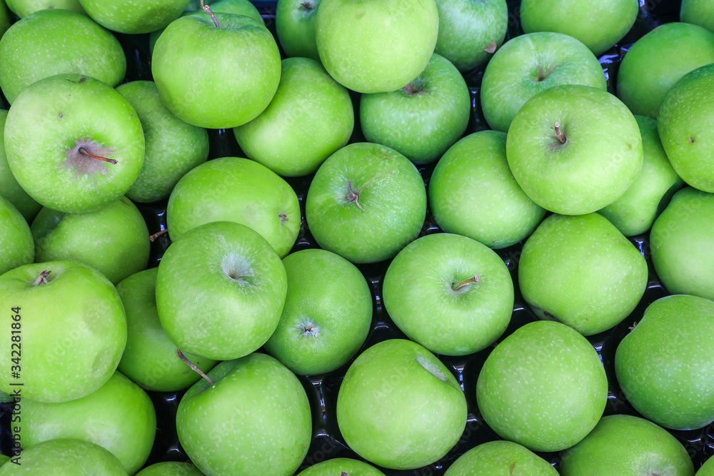 Green apples background. Top view of green apples. Green apples background. Top view of green apples.