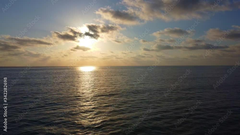 Sunset in the middle of the sea by drone Sunset in the middle of the sea by drone