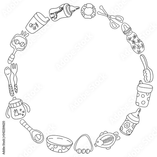 Round frame with baby goods on white background. Bottles, rattles, sippy cup, teether, fork, hair brush, nail scissors, bath water thermometer, spoon, bowl. Doodle style illustration in black ink.