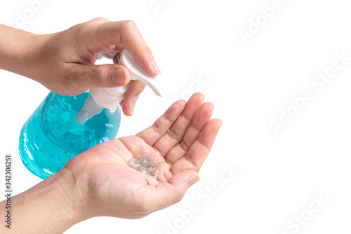 a hand pumping  the blue ethyl alcohol gel protection for coronavirus isolated on a white background with clipping path  top view