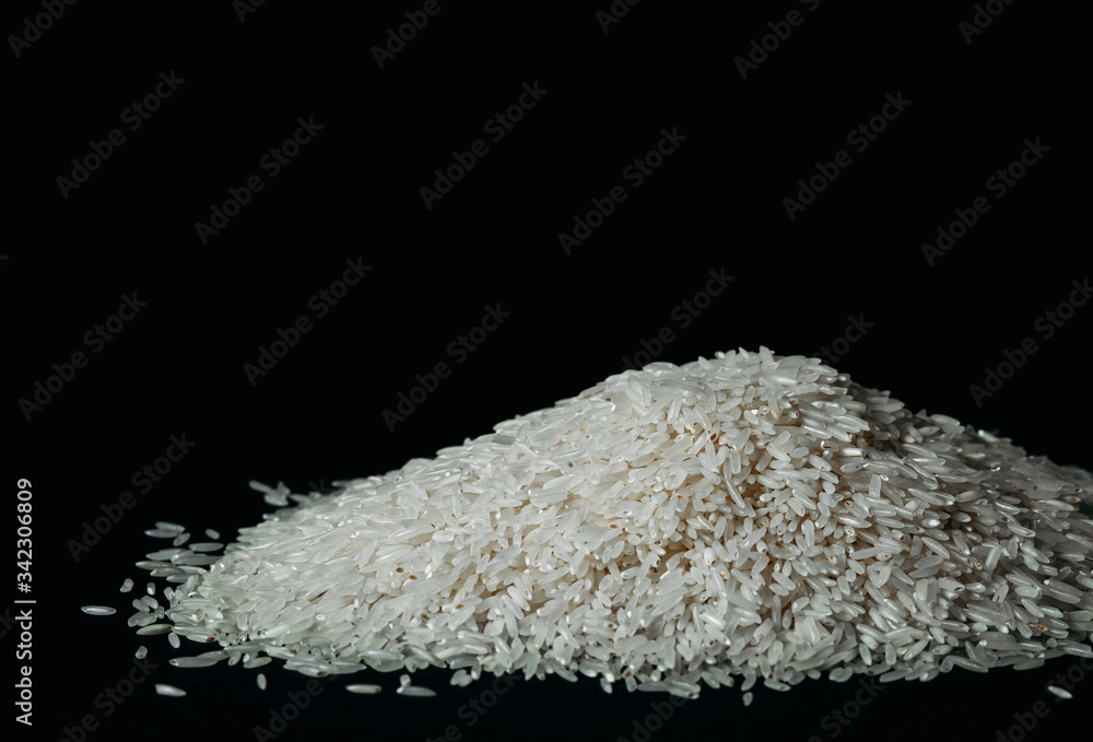 white rice on a black background copy space white rice on a black background copy space