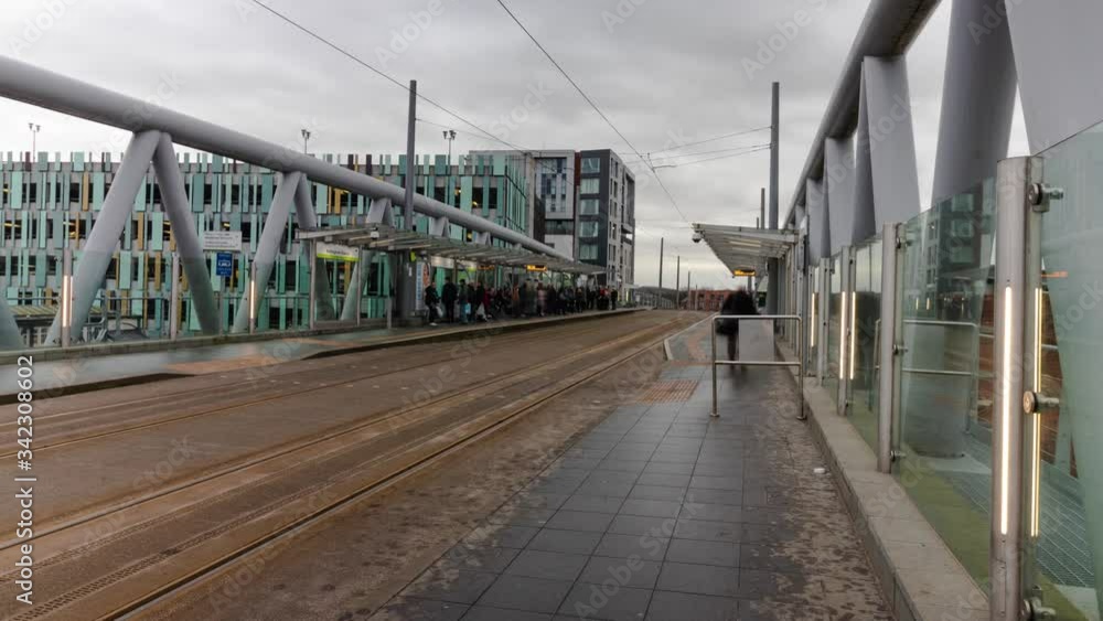 Nottingham, England: NET Tram Timelapse at Station stop of busy commuters Nottingham, England: NET Tram Timelapse at Station stop of busy commuters