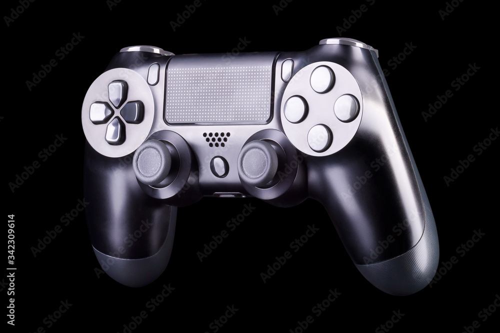 Black video game joystick gamepad isolated on a black background Black video game joystick gamepad isolated on a black background