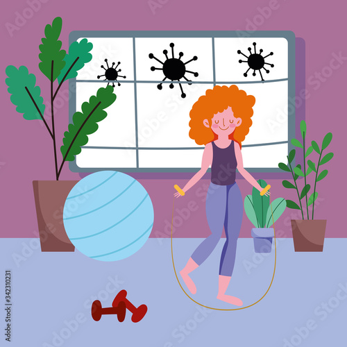 woman training with dumbbell and ball in the room, exercises at home