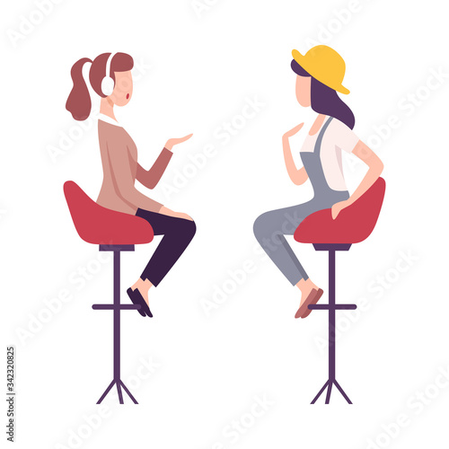 Journalist in Headphones Interviewing Female Celebrity, Two Young Woman Sitting on High Chairs and Talking to Each Other Flat Vector Illustration