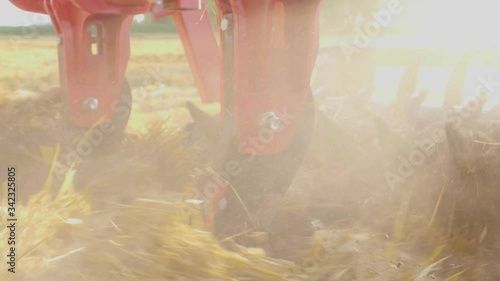 tractor in the field for tillage and cultivation 