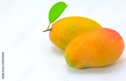 Ripe mango isolated on white background. 