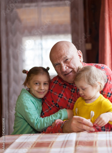 Little girls with her grandfather.
