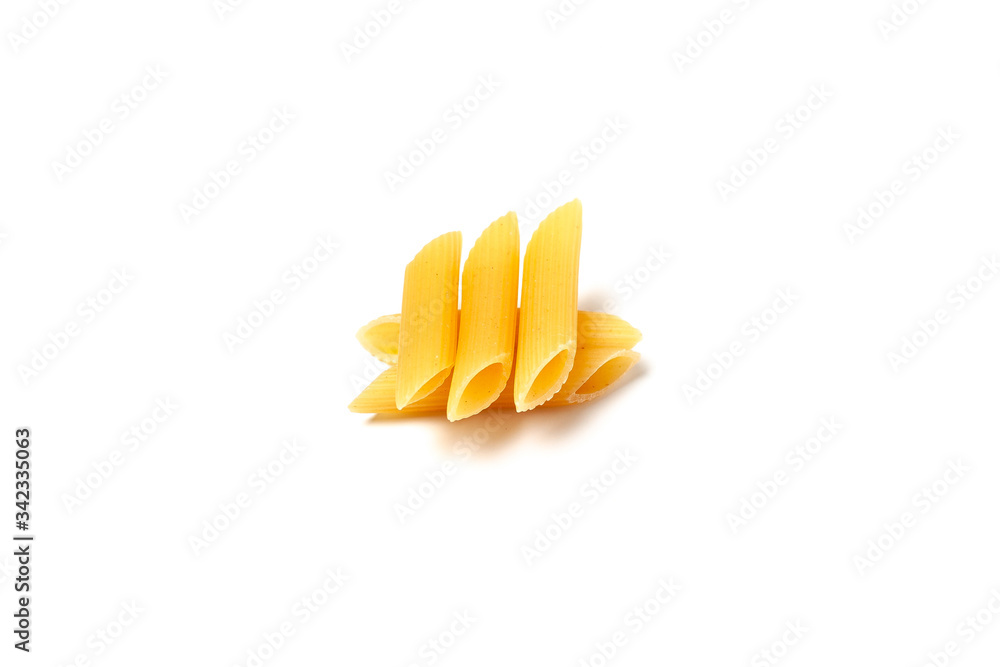 Penne pasta isolated. Raw macaroni isolated on white background. Penne pasta isolated. Raw macaroni isolated on white background.
