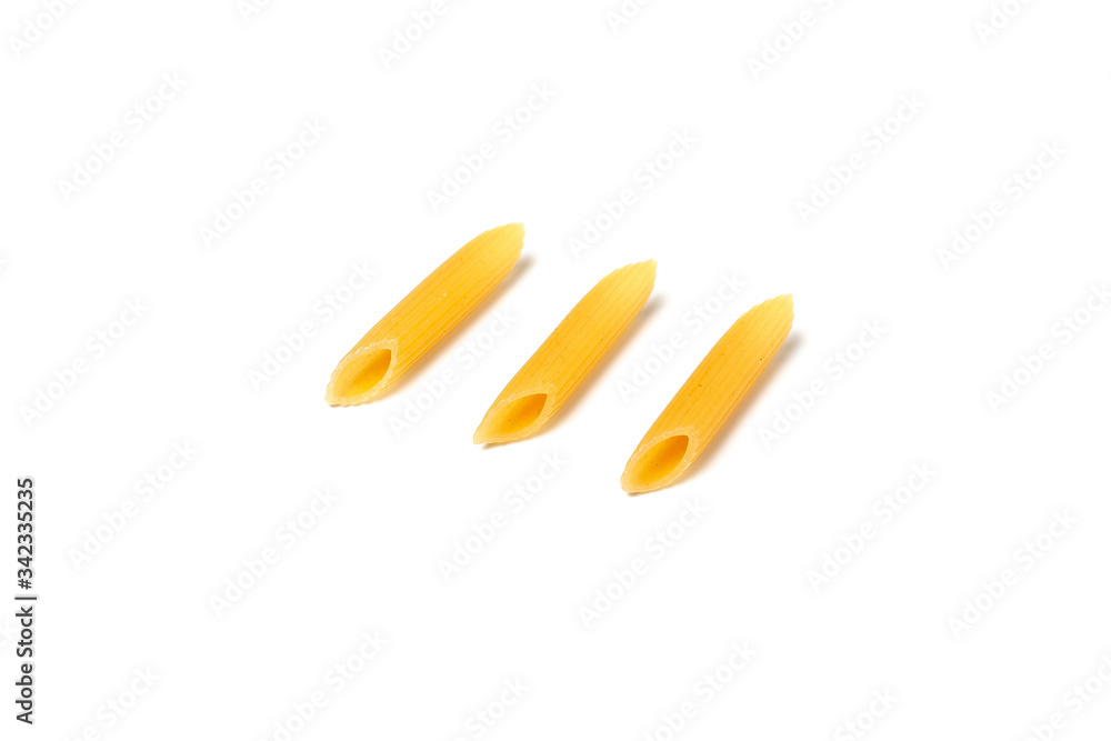 Penne pasta isolated. Raw macaroni isolated on white background. Penne pasta isolated. Raw macaroni isolated on white background.
