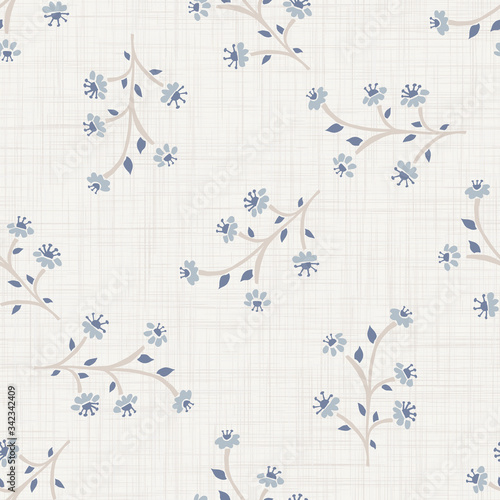 
Seamless herb floral pattern in french blue linen shabby chic style. Hand drawn country bloom texture. Rustic woven background. Kitchen towel home decor swatch. Simple flower motif all over print