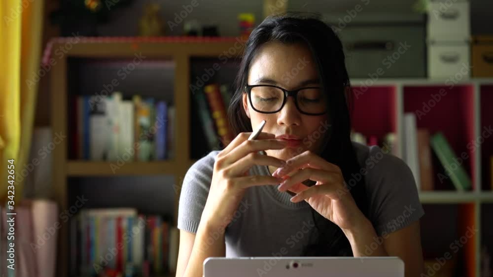 Woman thoughtful serious about work at home office desk laptop. Woman thoughtful serious about work at home office desk laptop.