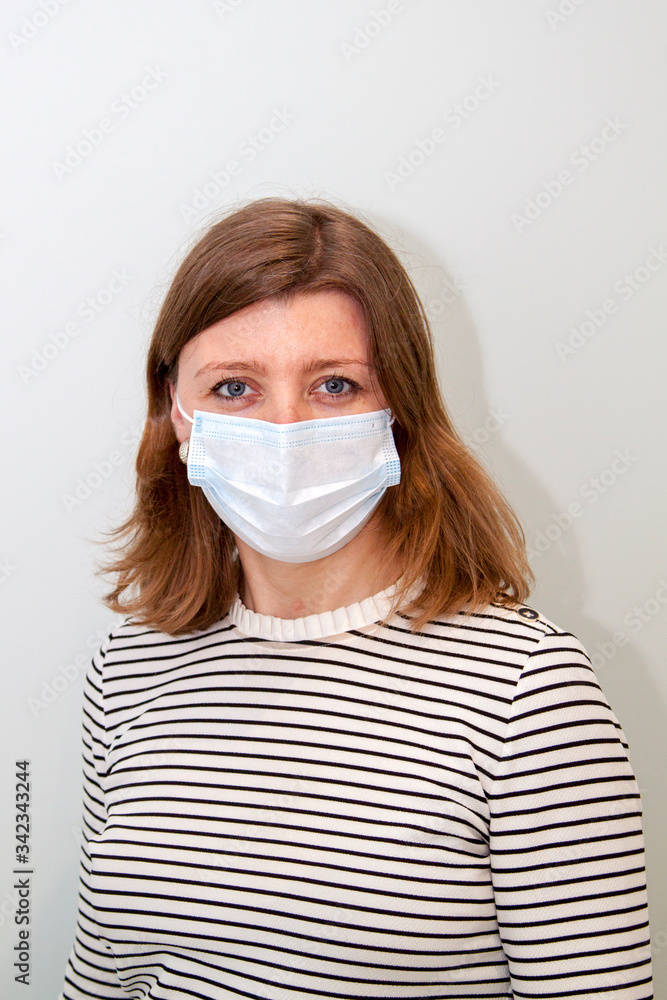 woman wearing an anti-virus protection mask to prevent flu infection, allergies, virus protection, COVID-19, and corona virus pandemic disease 2019 woman wearing an anti-virus protection mask to prevent flu infection, allergies, virus protection, COVID-19, and corona virus pandemic disease 2019