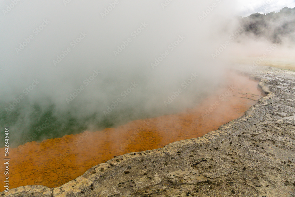 WAI-O-TAPU, NEW ZEALAND - MARCH 03, 2020: Steam clouds rising above the Champagne pool