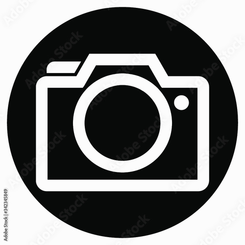 Photo camera vector icon on green background.