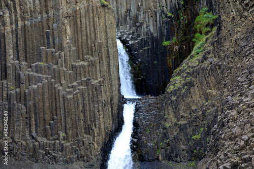 Iceland - August 29, 2017: The Litlanesfoss waterfall in Iceland with its basaltic columns, Iceland, Europe photo