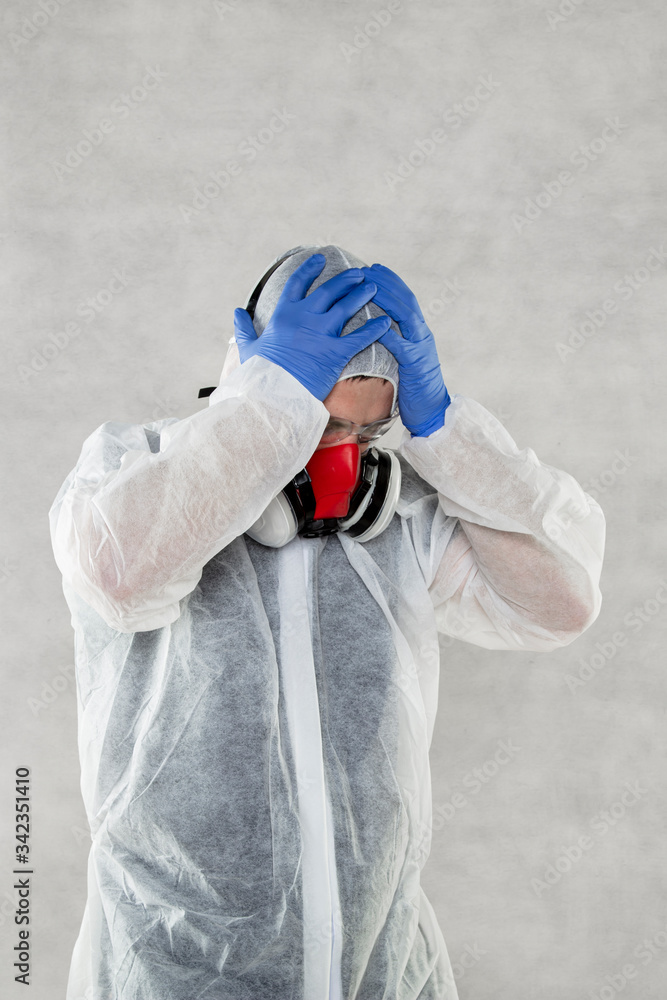 portrait of a virologist in a protective suit portrait of a virologist in a protective suit