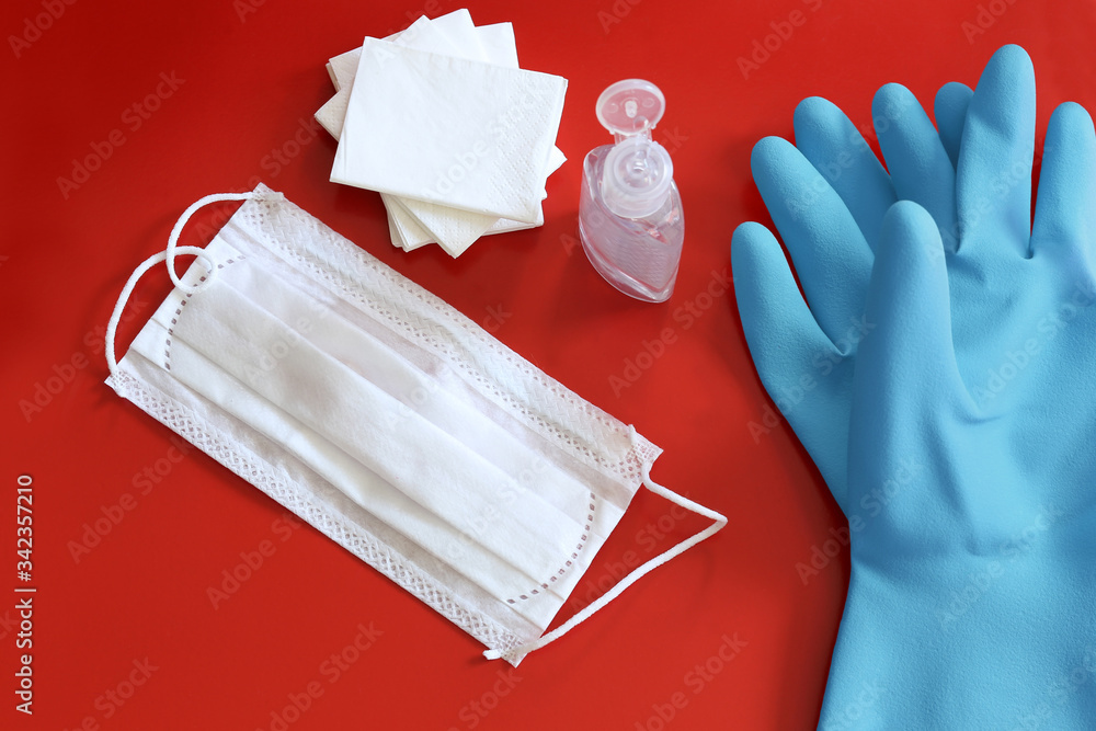 protections masque gel gants mouchoirs (fond rouge) Stock Photo | Adobe  Stock