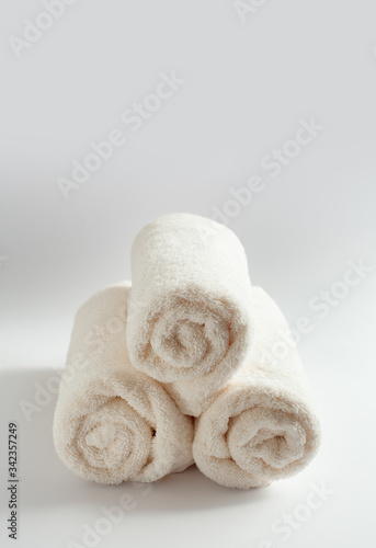Stack of spa white towels and copy space
