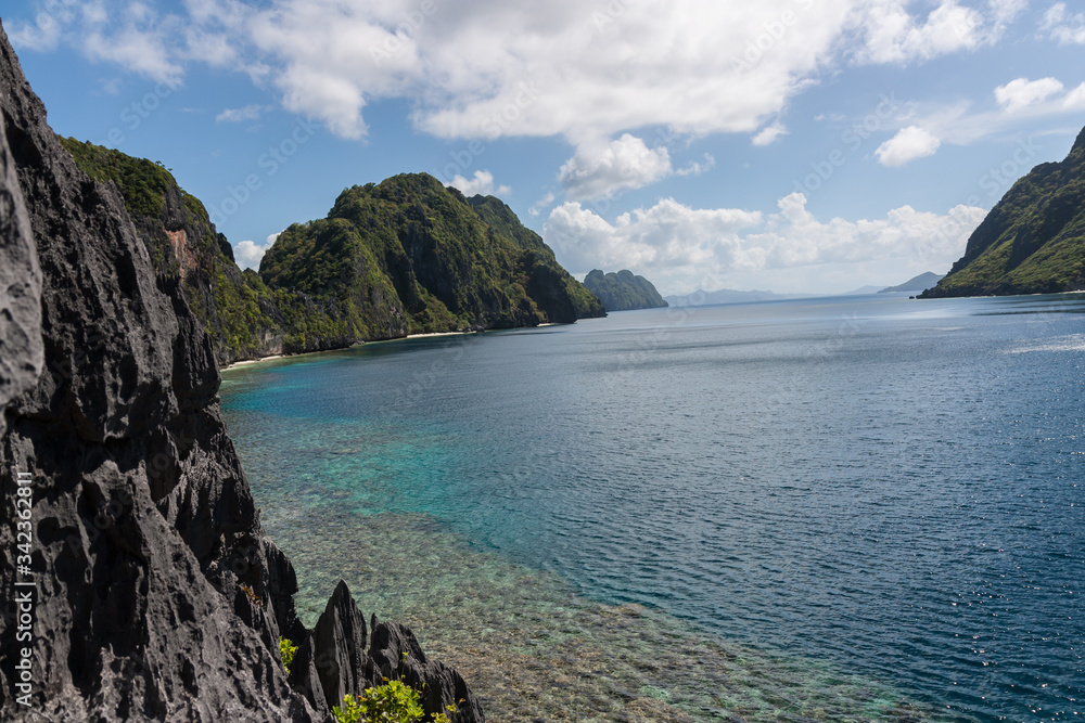 Transparent turquoise water  limestone razor rocks near Coron island Palawan