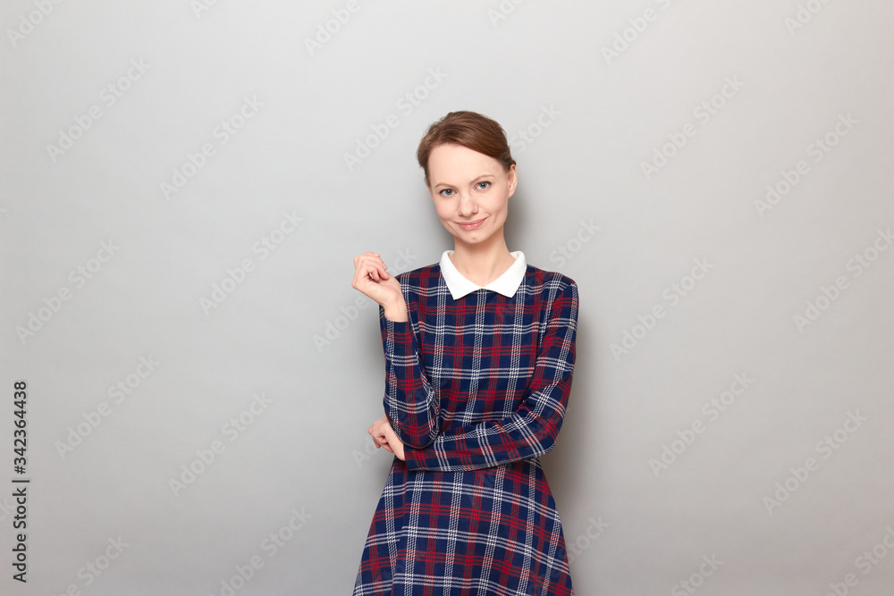 Portrait of cheerful young woman smiling and looking relaxed Portrait of cheerful young woman smiling and looking relaxed